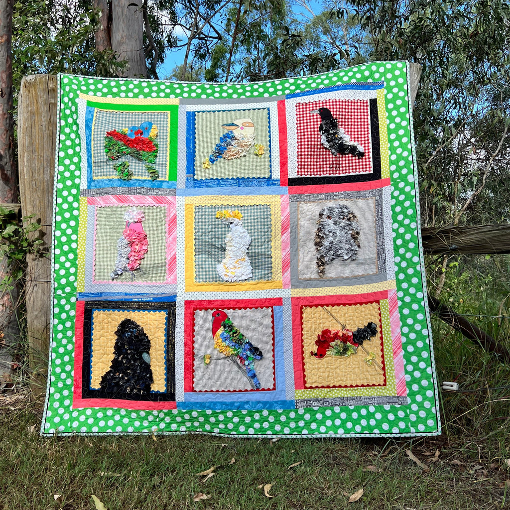 Image: full colour photo of Birds of a Feather quilt